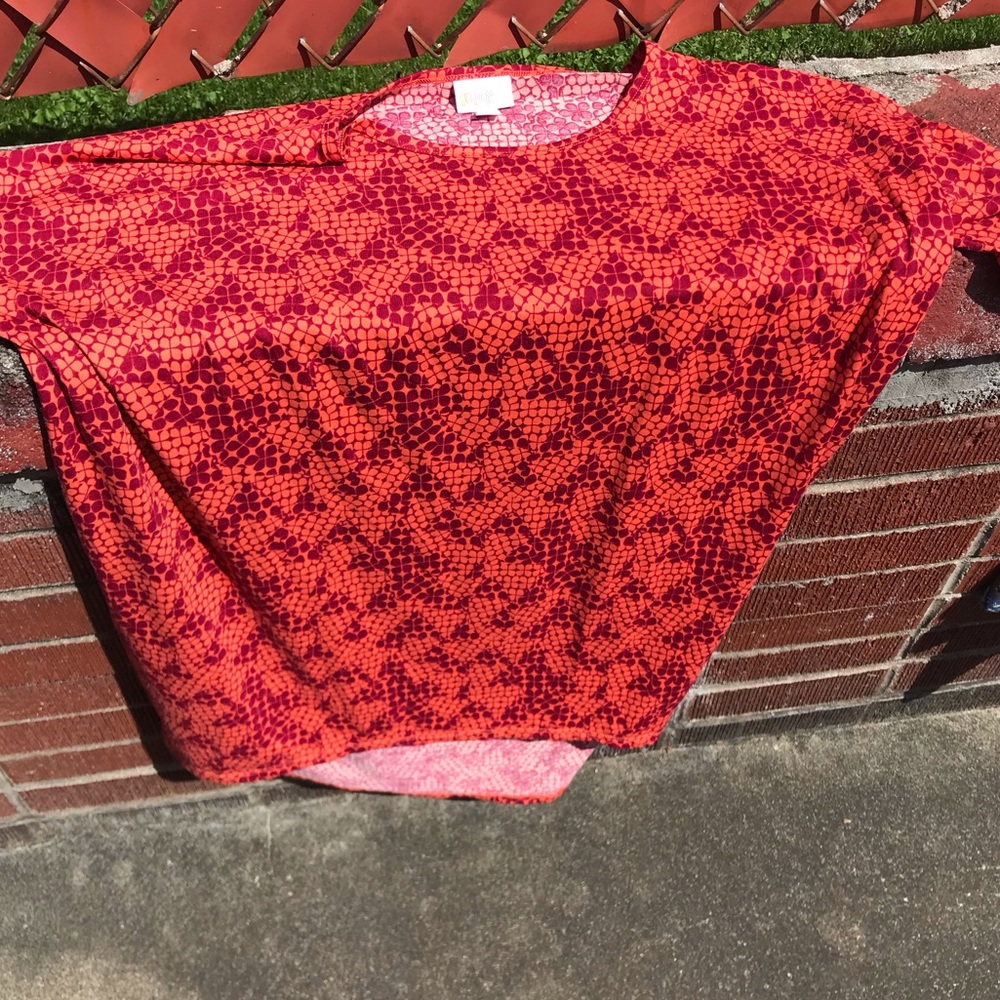 3 LuLaRoe women’s tops $20 for all.  2 Mediums and 1 is Small but fits like a M.